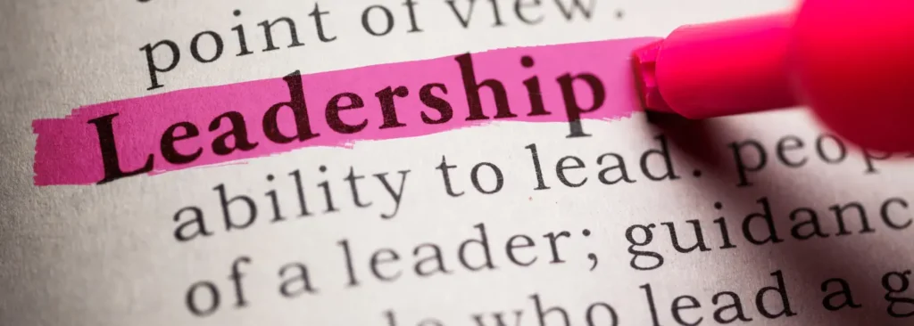 Close-up of the word leadership highlighted in a dictionary definition.