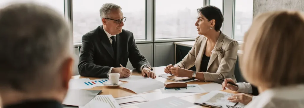 Sales leaders discussing performance and long-term sales follow-up strategy.