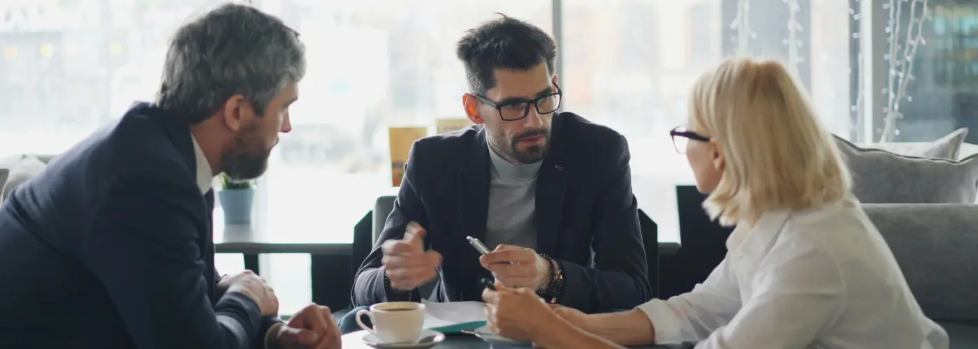 Customer-centric selling conversation where a sales professional focuses on understanding client goals instead of pushing product