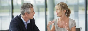 Sales discovery conversation between two professionals
